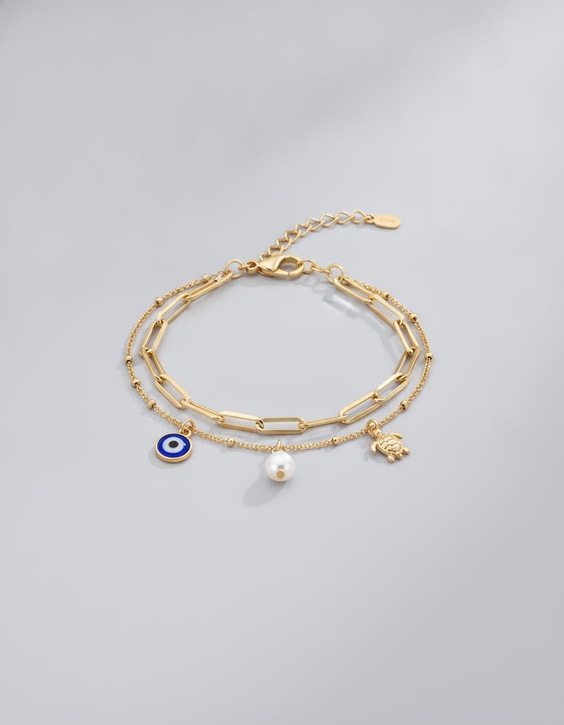 Dainty Layered Bracelet with Evil Eye, Pearl and Turtle Charms — studio main