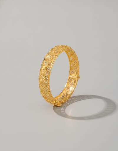 Hollow Four-Leaf Gold-Plated Open Bracelet